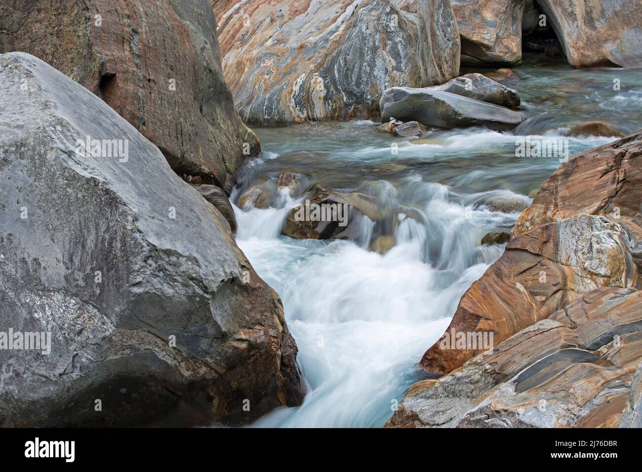 Water flowing through colored banded rocks hi-res stock photography and ...