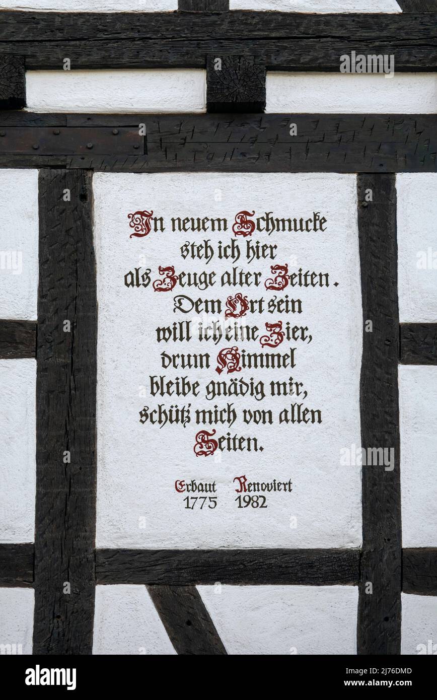Germany, Reutlingen, house saying on a renovated half-timbered house. In new ornamentation I stand here as a witness of old times. I want to be an ornament to the place, so heaven be merciful to me, protect me from all sides. Stock Photo