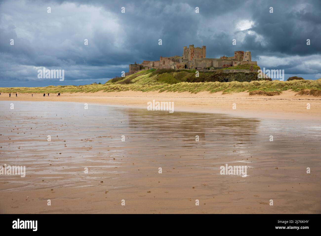 Bamburgh Castle on the coastline of Northumberland. Once the residence of the Kings of Northumbria, this imposing castle was much restored in the 19th Stock Photo
