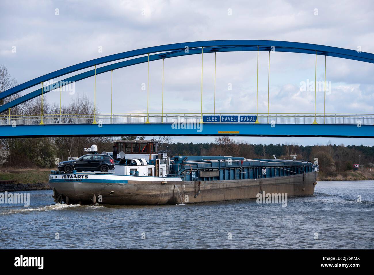 Germany, Saxony-Anhalt, Hohenwarthe, a barge is sailing along the Elbe-Havel Canal near the Niegripp lock. Stock Photo