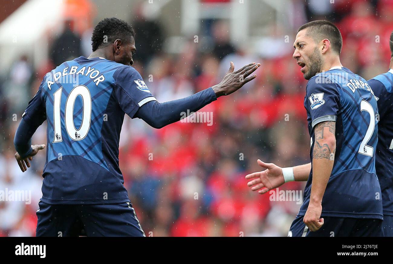 12 May 2013 - Soccer - Barclays Premier League - Stoke City Vs Tottenham Hotspur - Emmanuel Adebayor and Clint Dempsey of Tottenham Hotspur celebrate (1-1) -  Photographer: Paul Roberts / Pathos. Stock Photo
