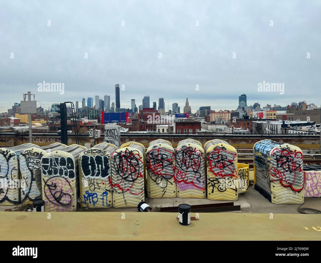 View of downtown Brooklyn in the distance from the elevated track bed