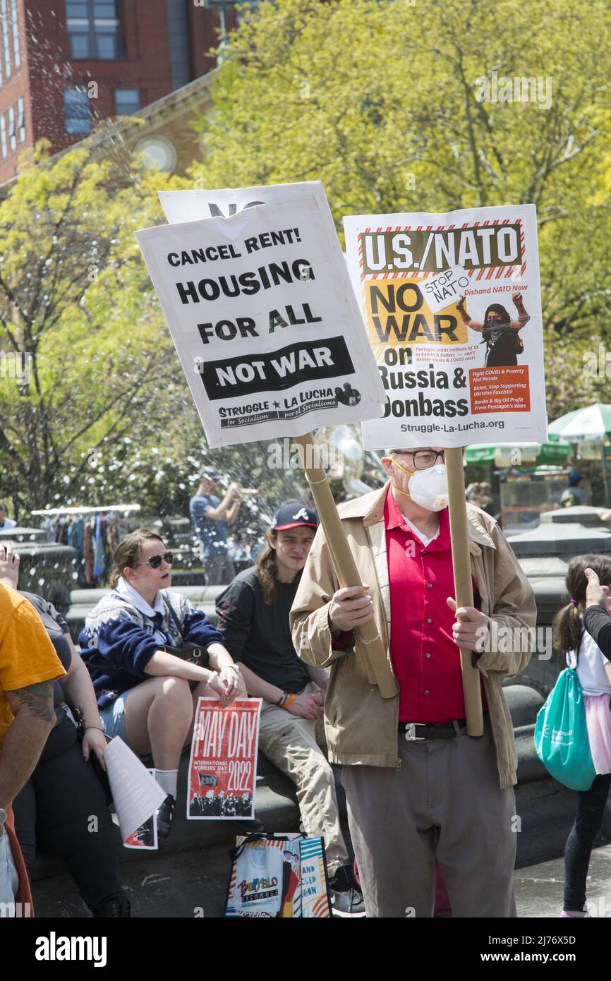 Annual May Day demonstration and march in New York City representing unions, workers and various social and political issues that effect the working class person. Stock Photo