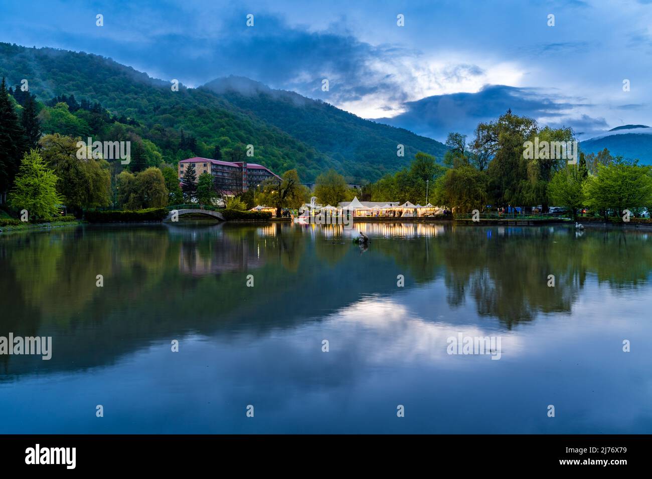 Dilijan, Armenia - May 6, 2022 - View of the beautiful  Dilijan's artificial lake on a late evening with mountains and sky reflection in the lake Stock Photo