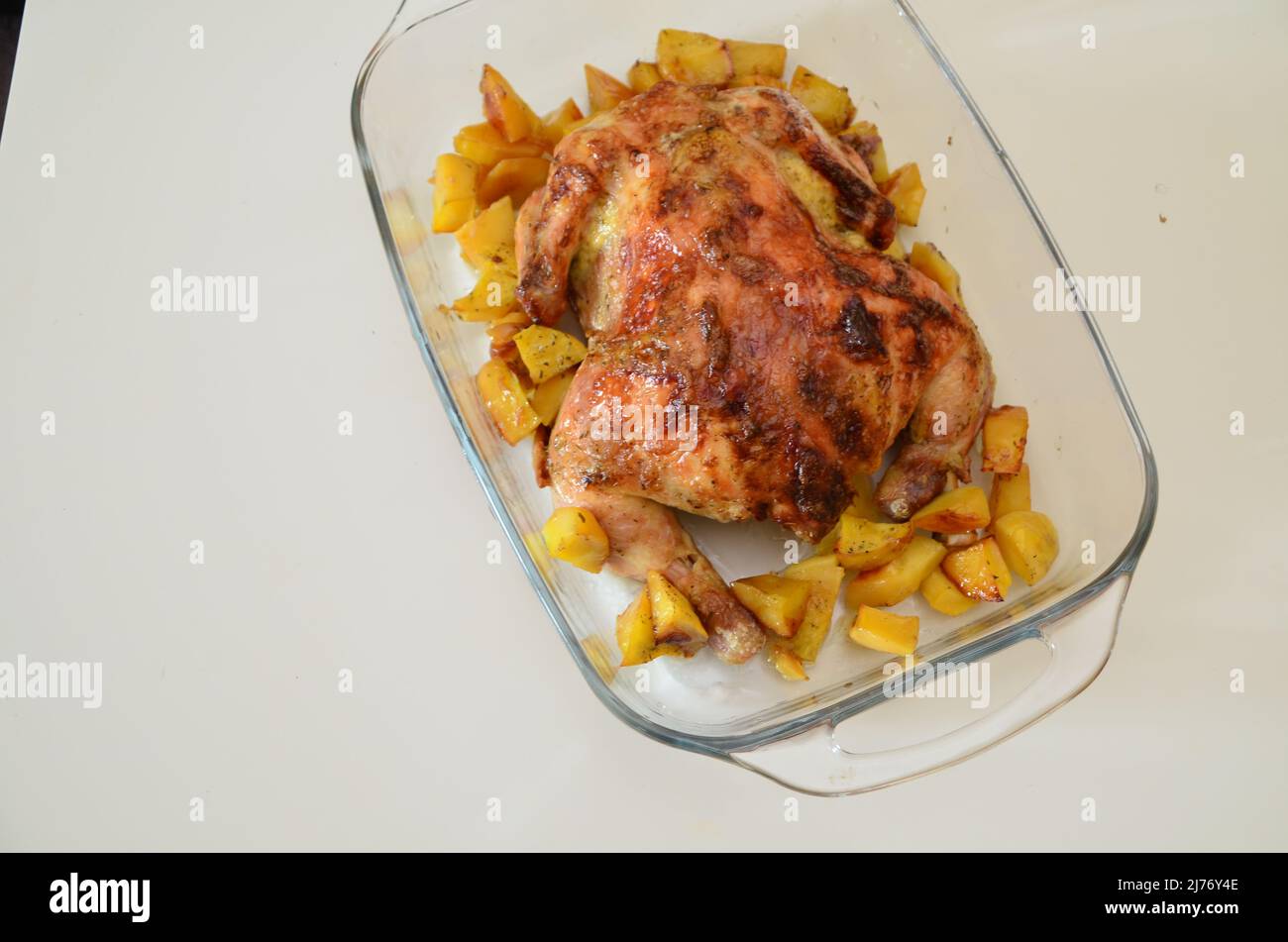 Raw whole chicken with fresh herbs and peas on black stone background, top  view. Culinary white meat eating. Organic chicken Stock Photo - Alamy