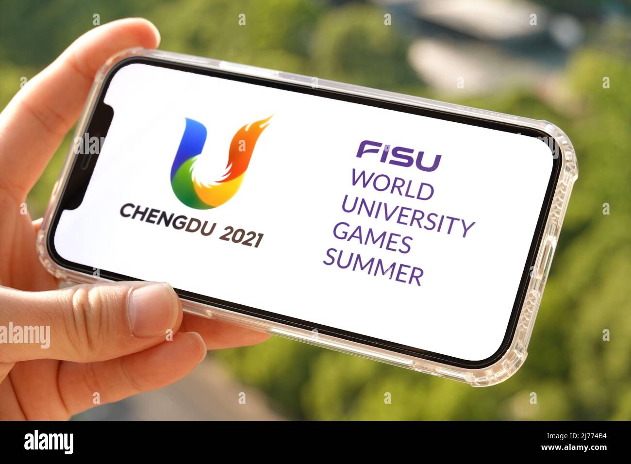 In this photo illustration, the logo of Chengdu World University Games is displayed on a smartphone screen. The Chengdu 2021 World University Games has been postponed until 2023, the International University Sports Federation (FISU) announced on Friday.The FISU Games had initially been scheduled for the summer of 2021 but were rescheduled for June this year following the postponement of the Olympic Games in Tokyo 2020. (Photo by Sheldon Cooper / SOPA Images/Sipa USA) Stock Photo