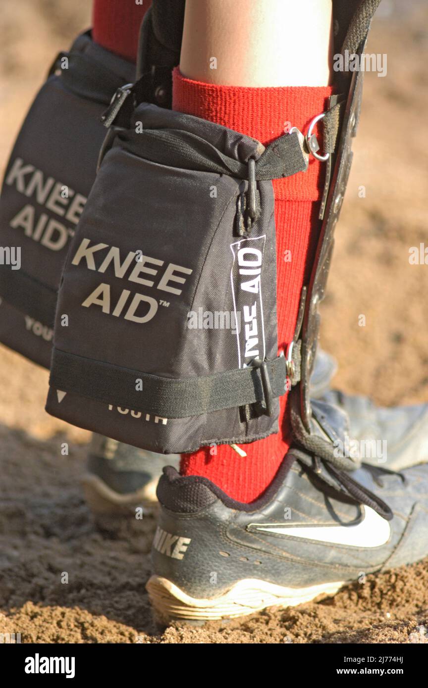 Knee Aids for young girl baseball and softball catchers for protection