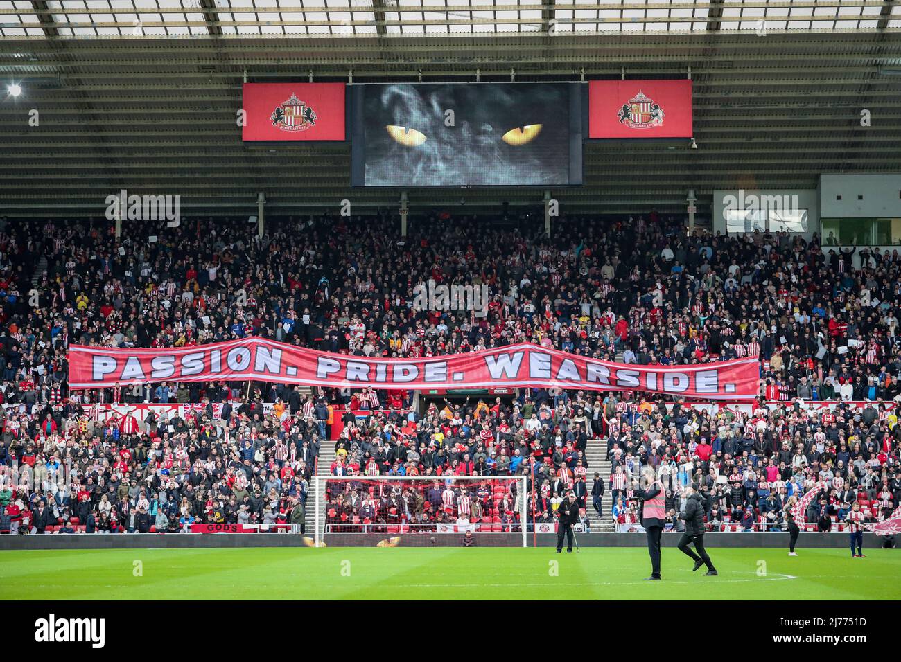 Passion, Pride, Wearside is held up by the Sunderland supporters on a banner ahead of the game Stock Photo