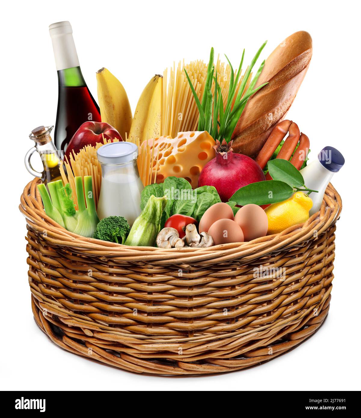 Food basket. Vast of different vegetables and products in the wicker basket on white background. Stock Photo