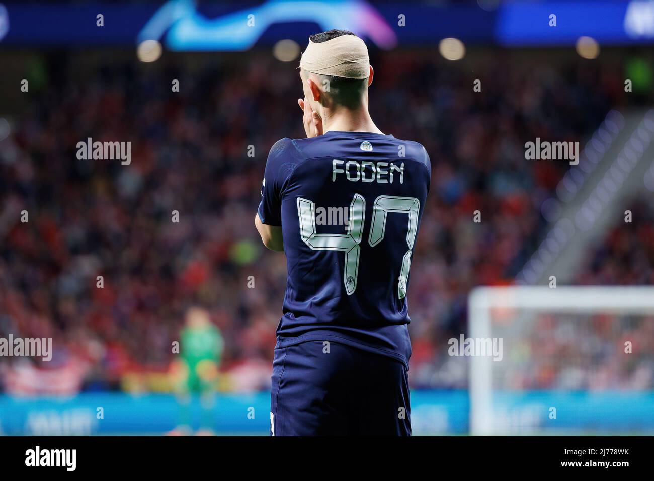 MADRID - APR 13: Phil Foden in action during the Champions League match between Club Atletico de Madrid and Manchester City at the Metropolitano Stadi Stock Photo
