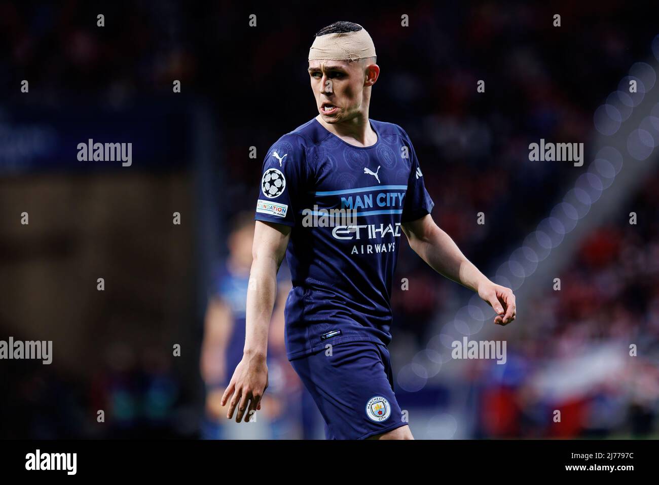 MADRID - APR 13: Phil Foden in action during the Champions League match between Club Atletico de Madrid and Manchester City at the Metropolitano Stadi Stock Photo