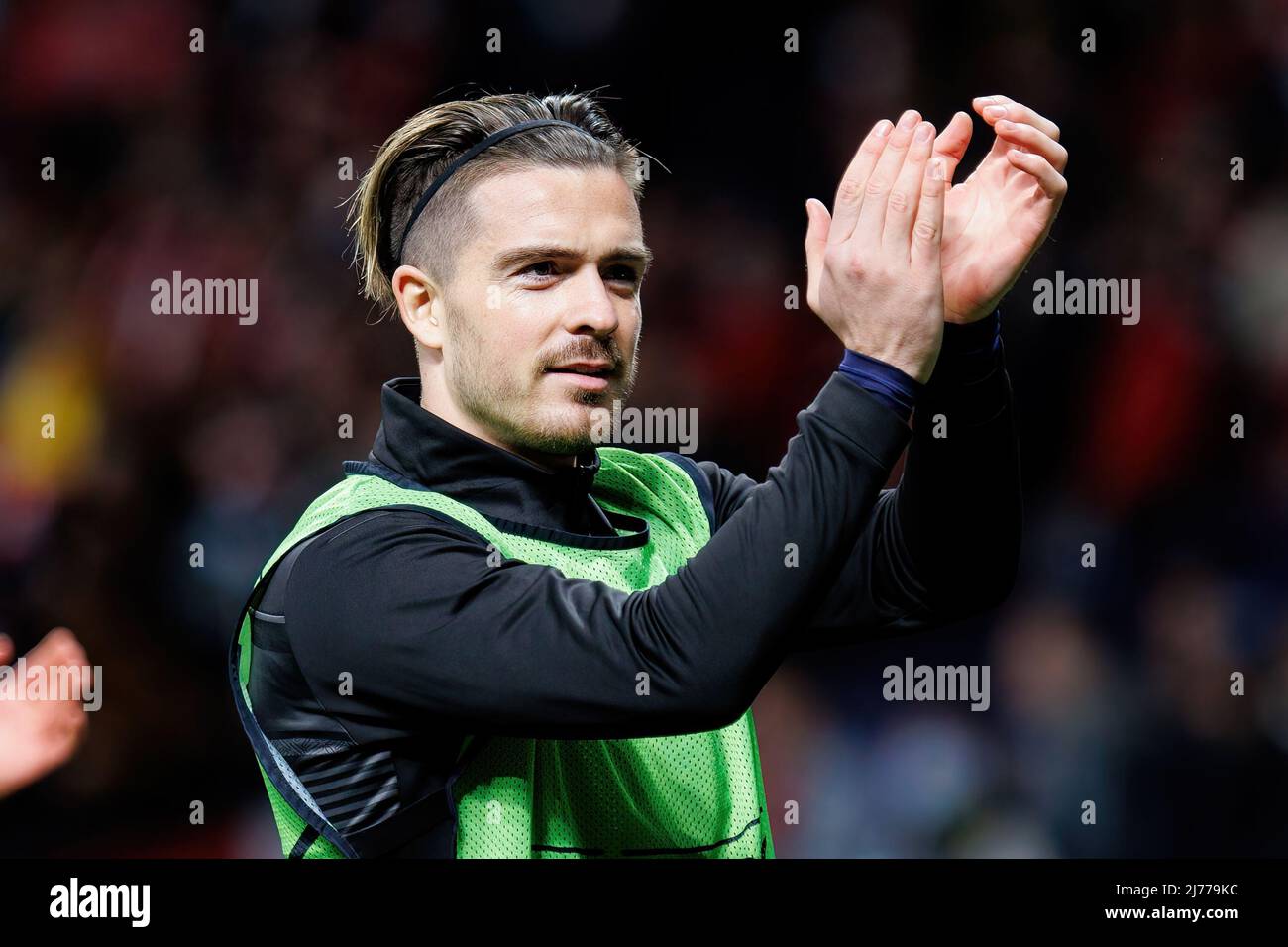 MADRID - APR 13: Grealish celebrates the victory after the Champions League match between Club Atletico de Madrid and Manchester City at the Metropoli Stock Photo