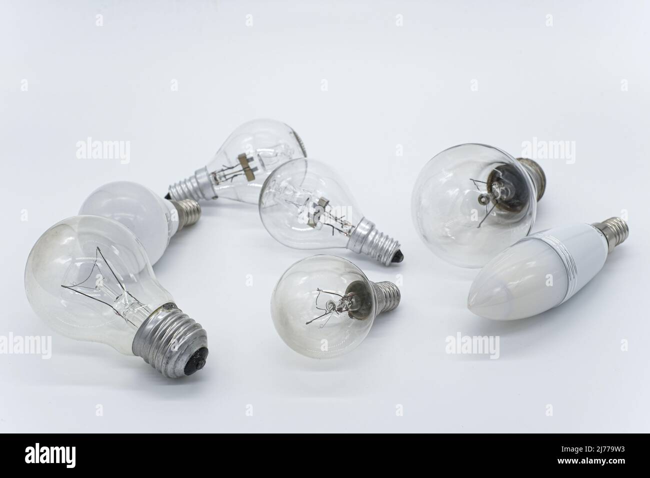Different technology lamp light bulbs on white isolated background Stock Photo