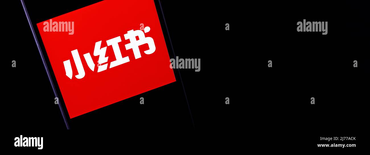 Xiaohongshu (also known as Little Red Book) banner editorial. Illustrative banner for news about Xiaohongshu - a social media and e-commerce platform Stock Photo