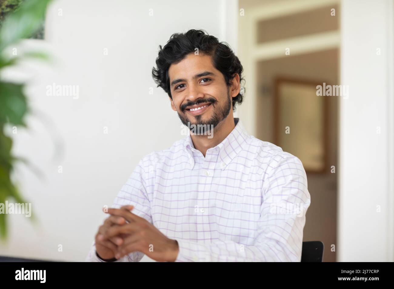 young man working as manager in an office Stock Photo