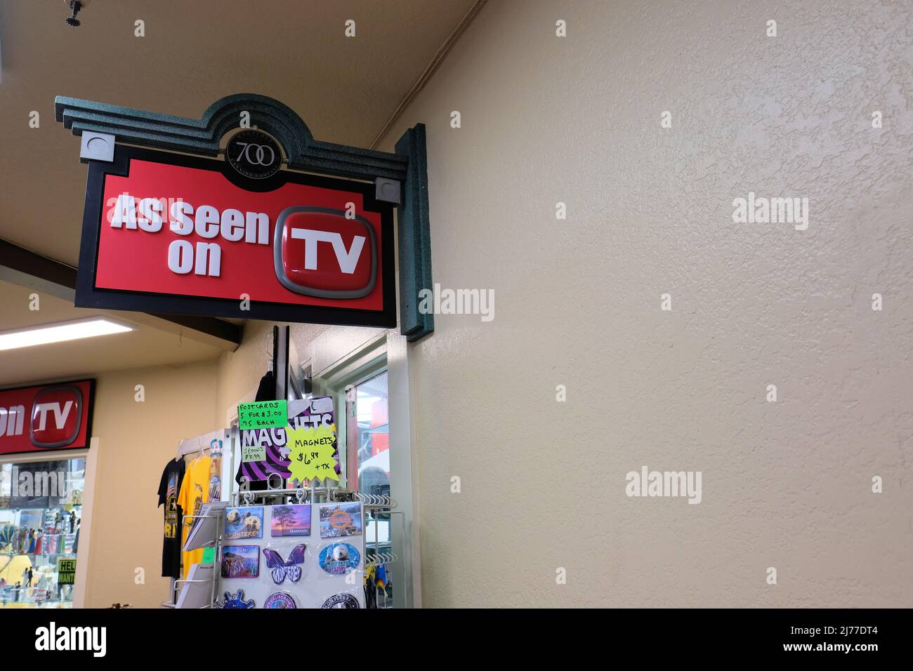 As Seen on TV retail shop sign at the entrance to a store selling products  advertised on television through infomercials; As Seen on TV brand name  Stock Photo - Alamy