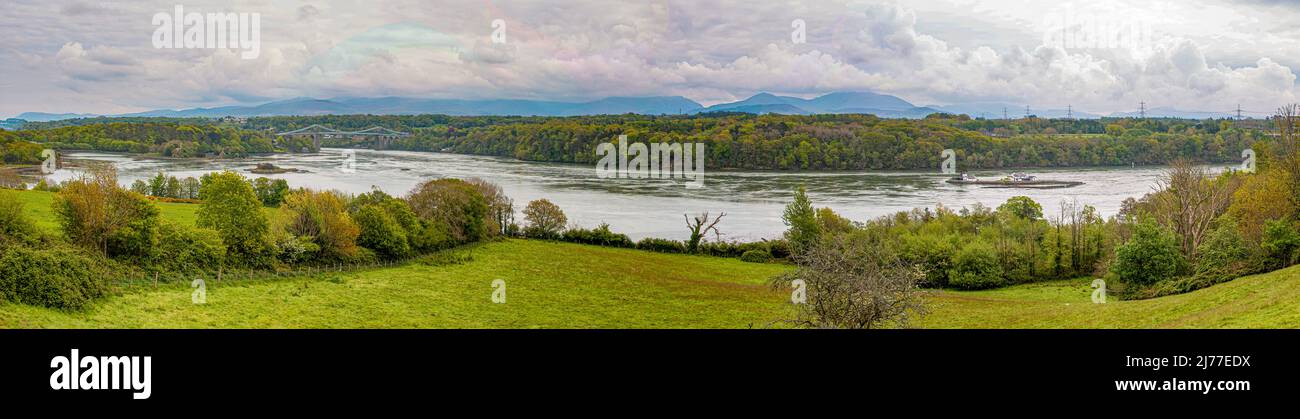 The Menai suspension bridge, over the Menai,designed by Thomas Telford to connect the mainland with the island of Anglesey, North Wales Stock Photo