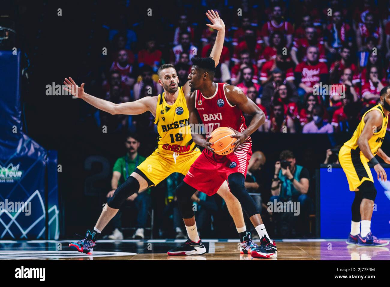 Bilbao, Basque Country, SPAIN. 7th May, 2022. YANKUBA SIMA (77) of Manresa with the ball controlled against JONAS WOHLFARTH-BOTTERMANN (18) of Ludwigsburg during the Basketball Campions League semi-final game between MHP Riesen Ludwigsburg and Baxi Manresa at Bilbao Arena.Bilbao hosted the first ever Basketball Champions League Final 4 in a neutral venue. (Credit Image: © Edu Del Fresno/ZUMA Press Wire) Stock Photo