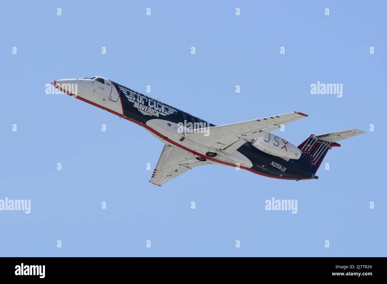 Image of JSX Embraer ERJ-135LR jet with registration N259JX. Plane shown painted in a Top Gun Maverich scheme. Stock Photo