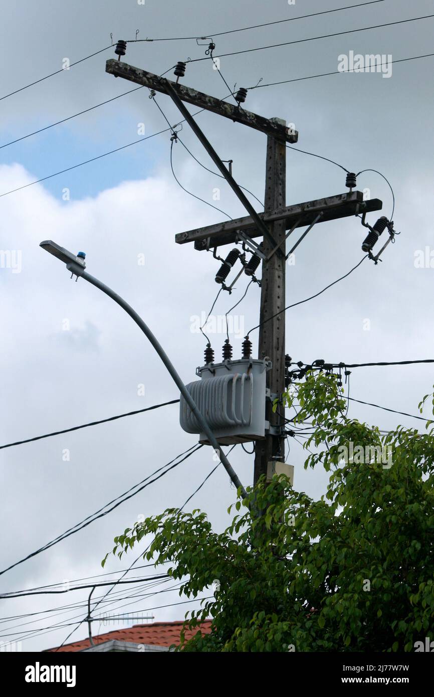 feira de santana, bahia, brazil - may 6, 2022: Electric network transformer is seen on a pole in the city of Feira de Santana. Stock Photo