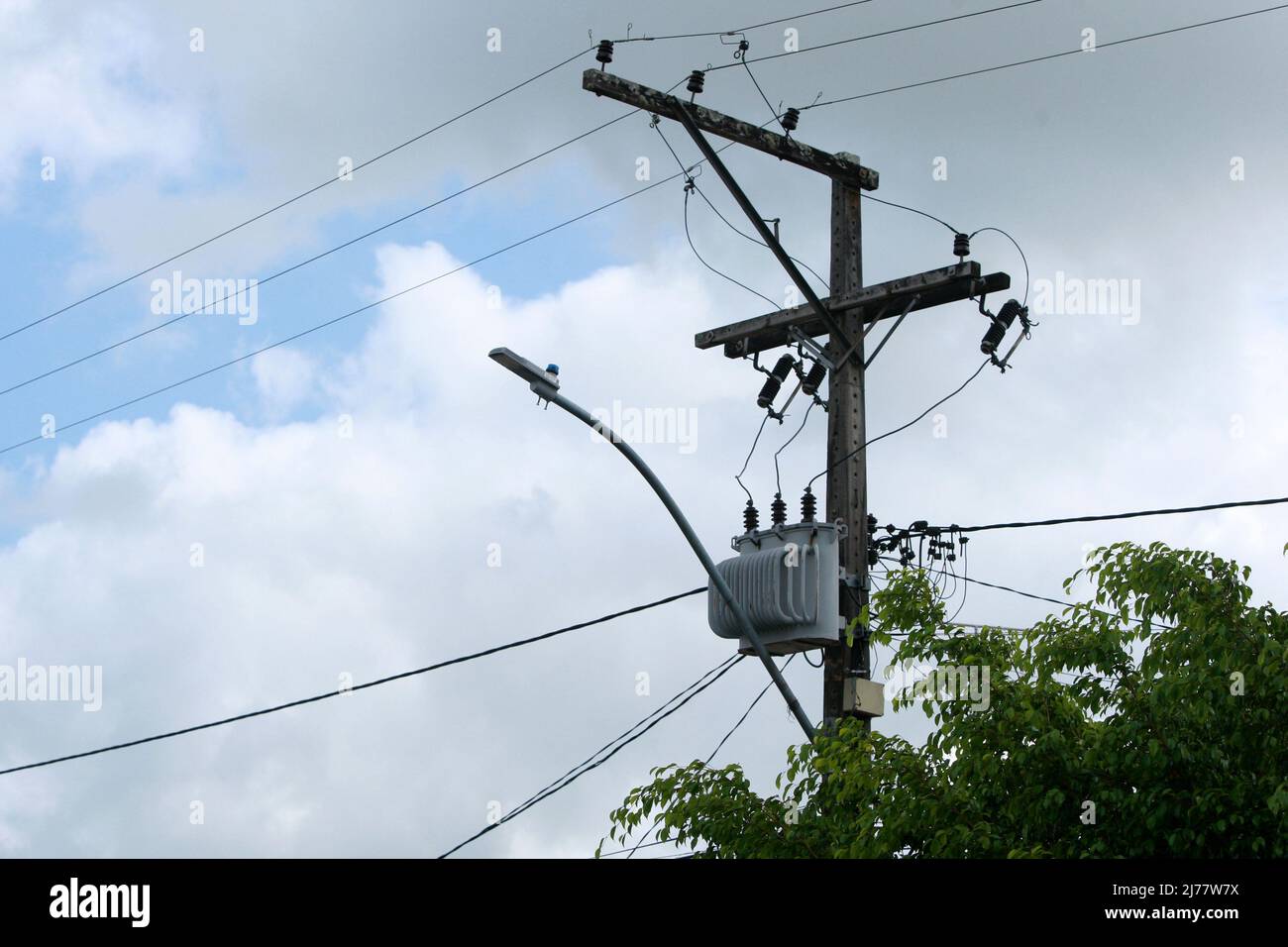 feira de santana, bahia, brazil - may 6, 2022: Electric network transformer is seen on a pole in the city of Feira de Santana. Stock Photo