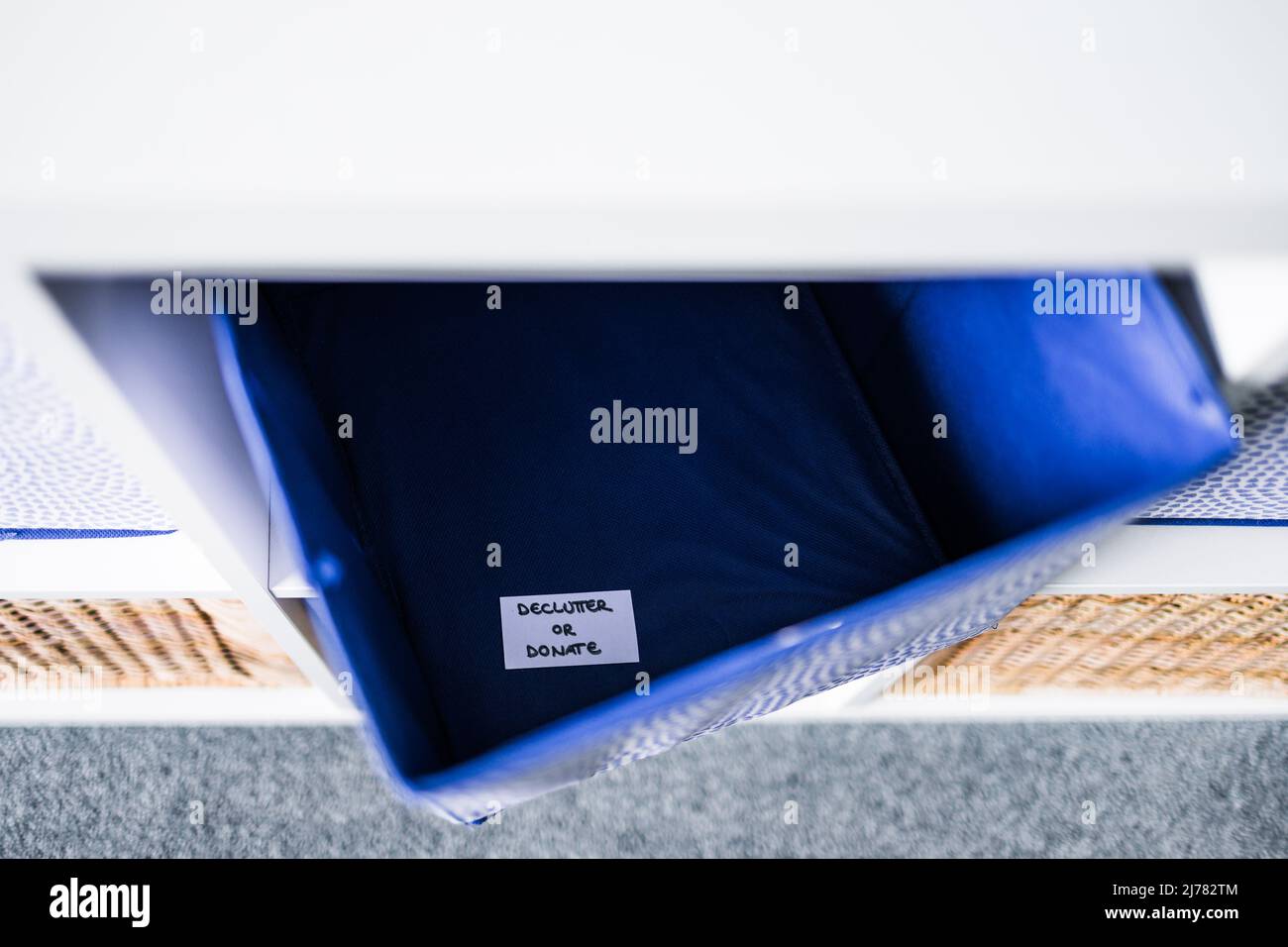 Unfocused Labels storage cube with Declutter of Dornate label inside of it with ...
