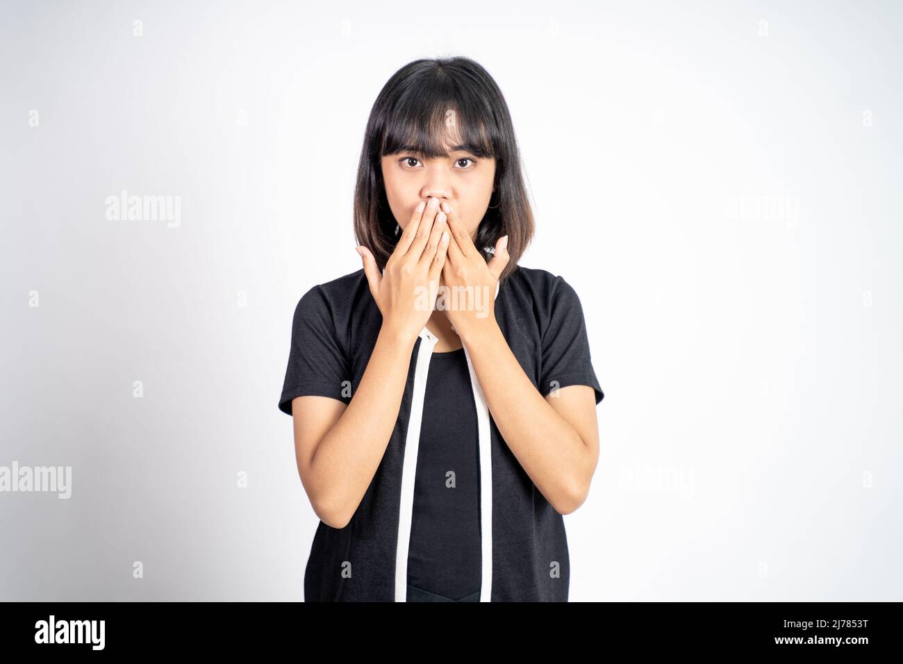 portrait of asian woman covering her mouth with hands Stock Photo - Alamy
