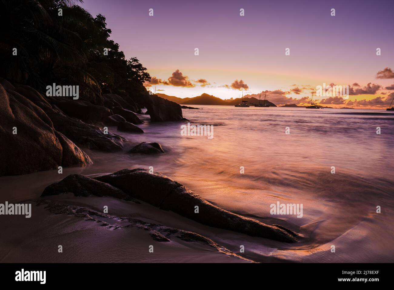 Anse Patates beach, La Digue Island, Seychelles, white beach with blue