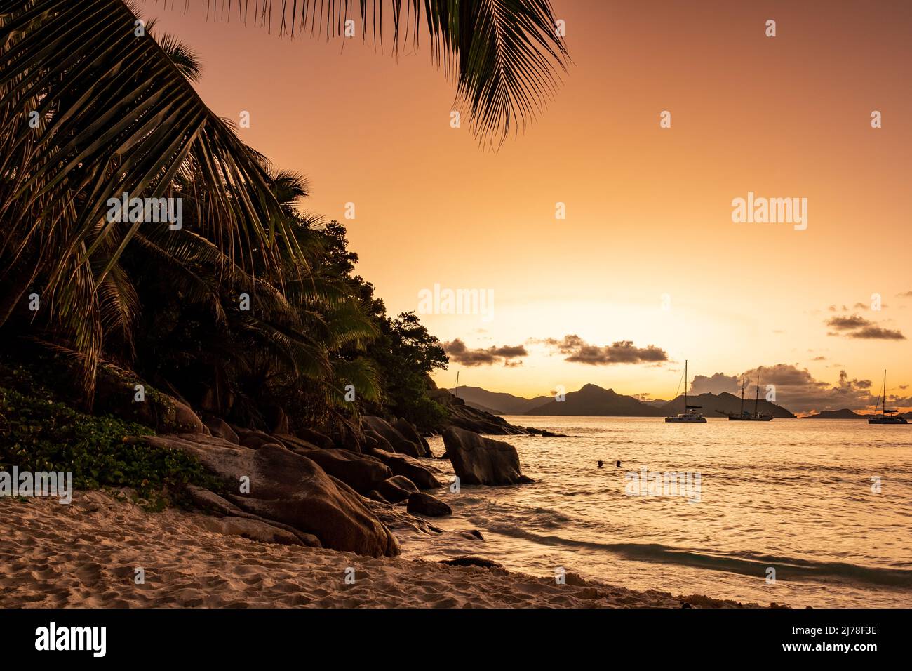 Anse Patates beach, La Digue Island, Seychelles, white beach with blue