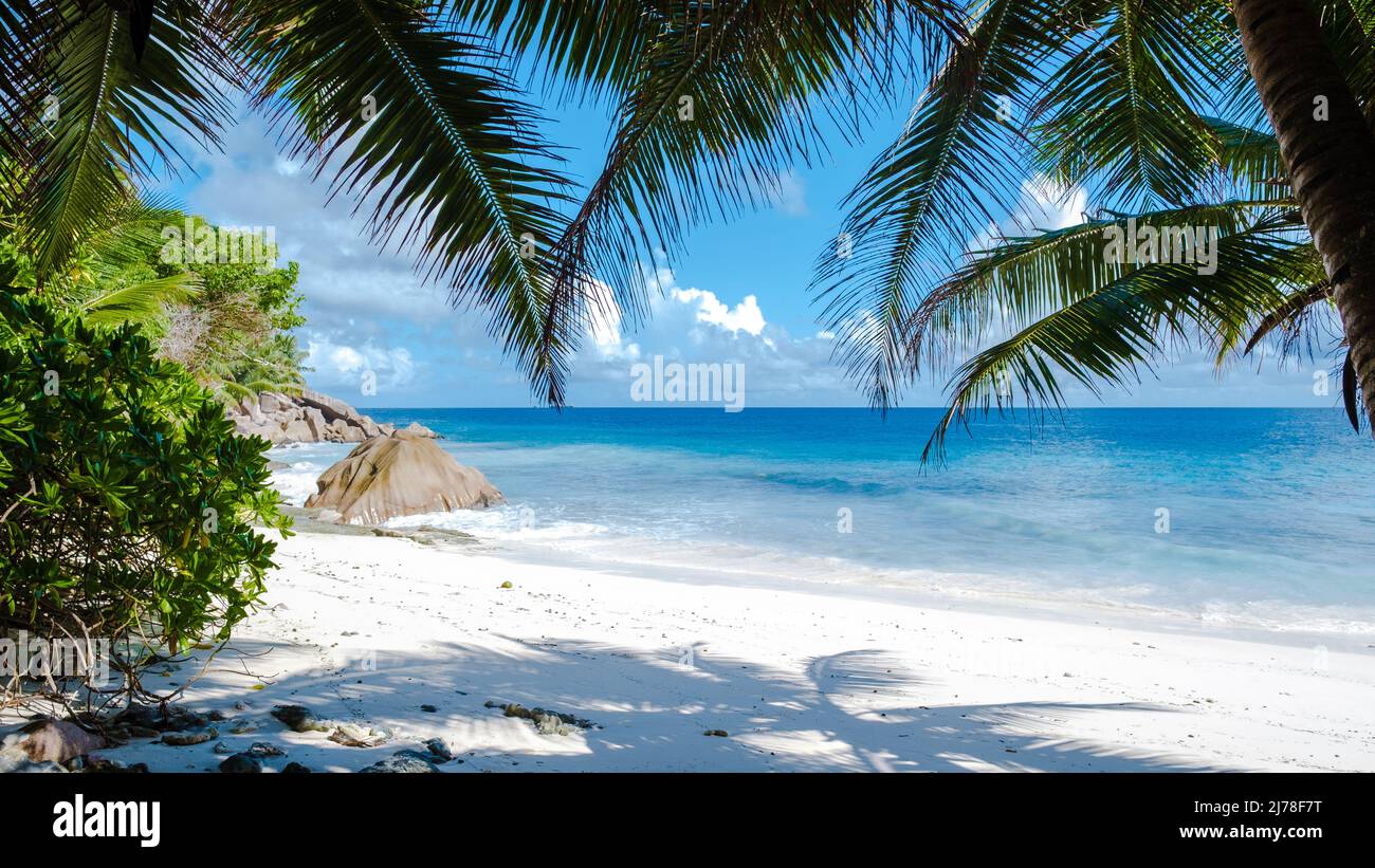 Anse Patates beach, La Digue Island, Seychelles, white beach with blue