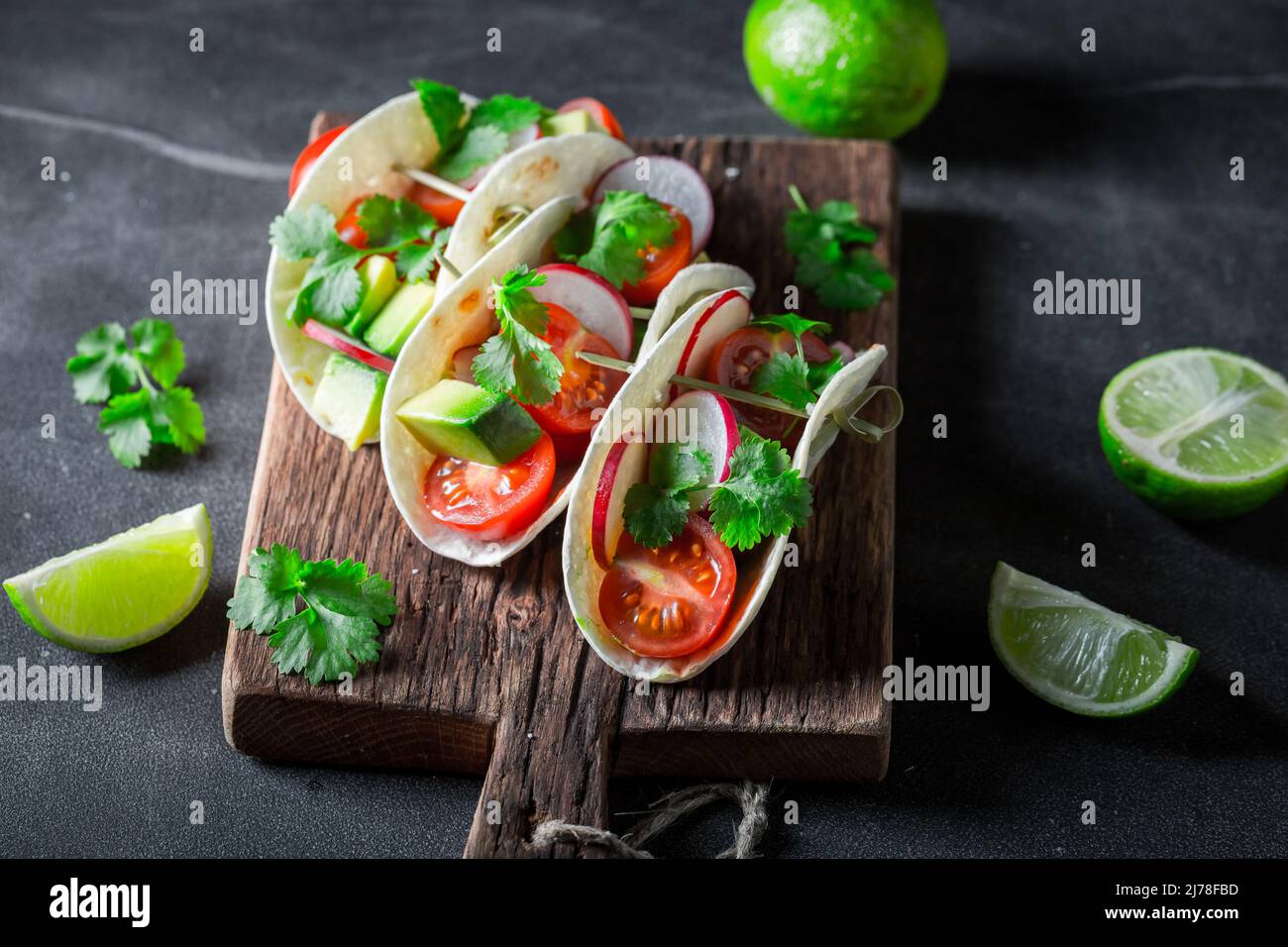 Mexican and spicy tacos with avocado, coriander and lime. Mexican Tacos