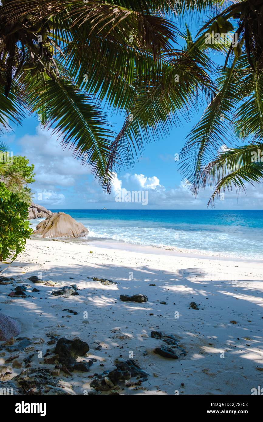 Anse Patates beach, La Digue Island, Seychelles, white beach with blue