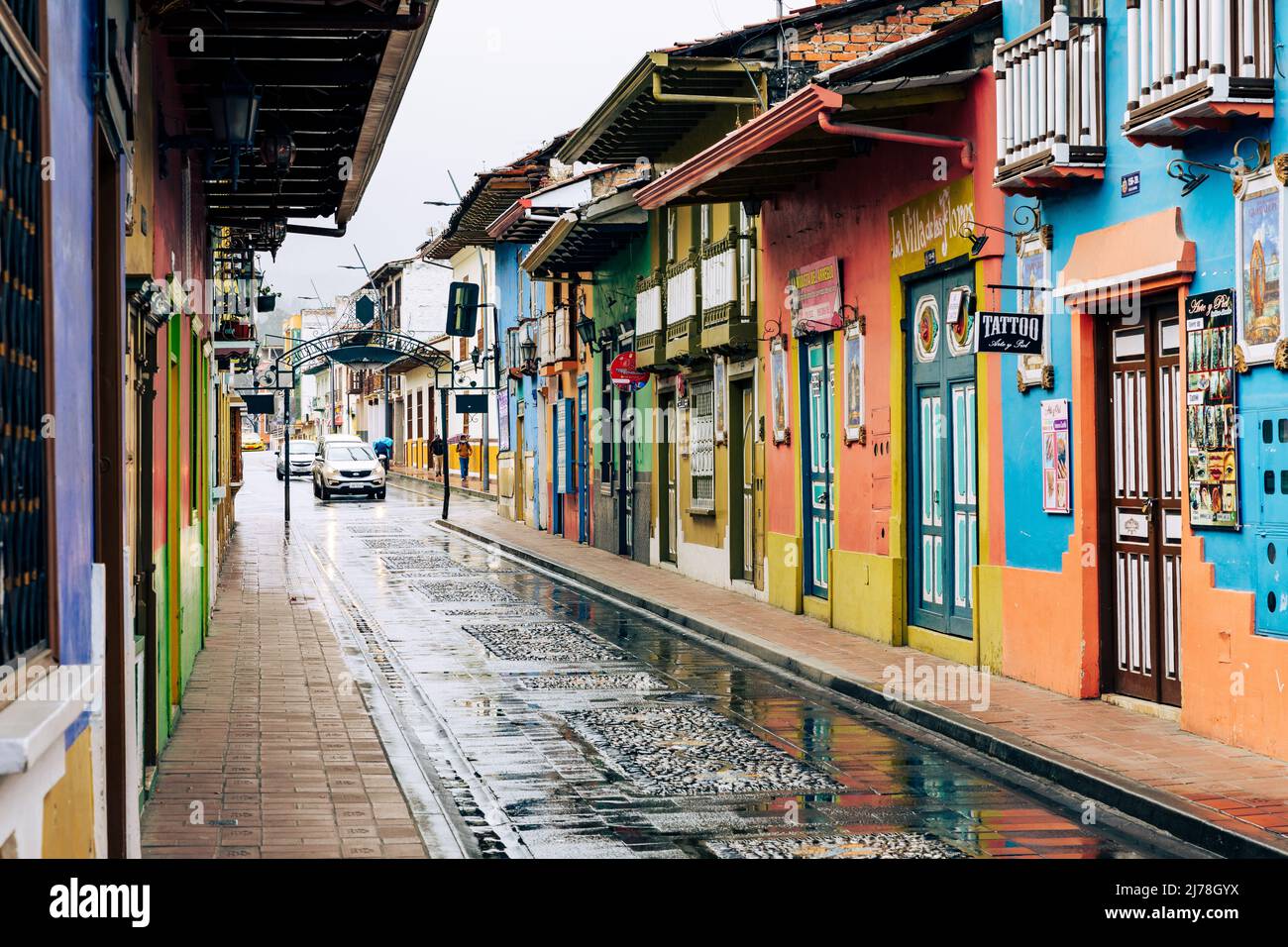 LOJA, ECUADOR - APRIL 15, 2022: Colorful colonial houses in Lourdes street in Loja, Ecuador. South America. Stock Photo