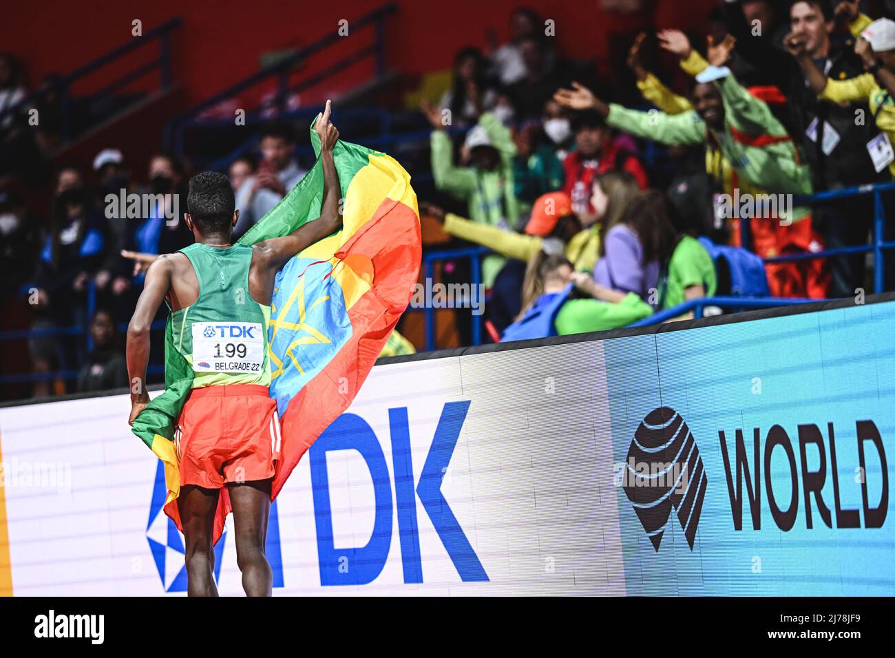 Selemon Barega with the Ethiopia flag at the Belgrade 2022 Indoor World Championships. Stock Photo