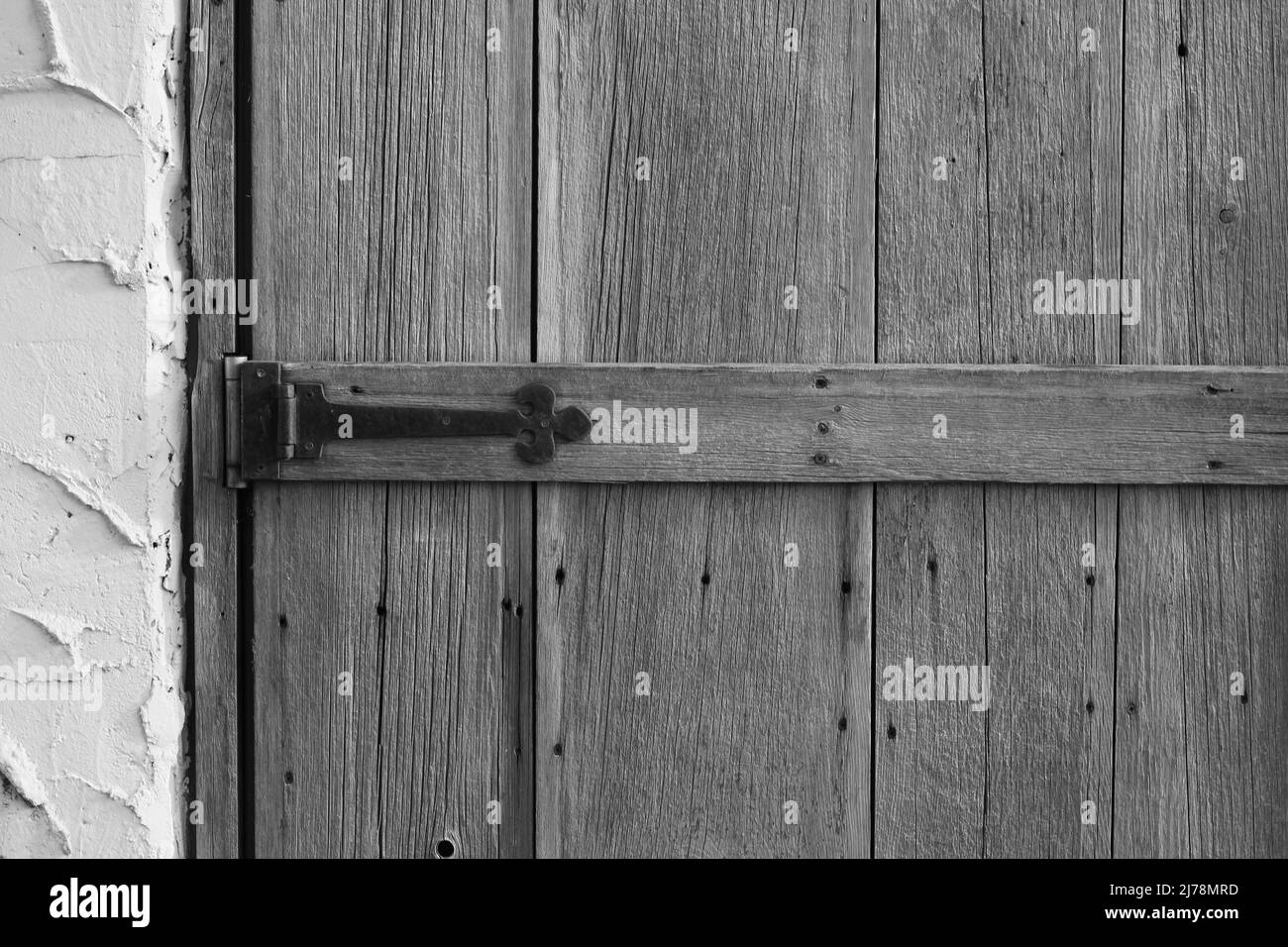Vintage worn wooden door in black and white Stock Photo - Alamy