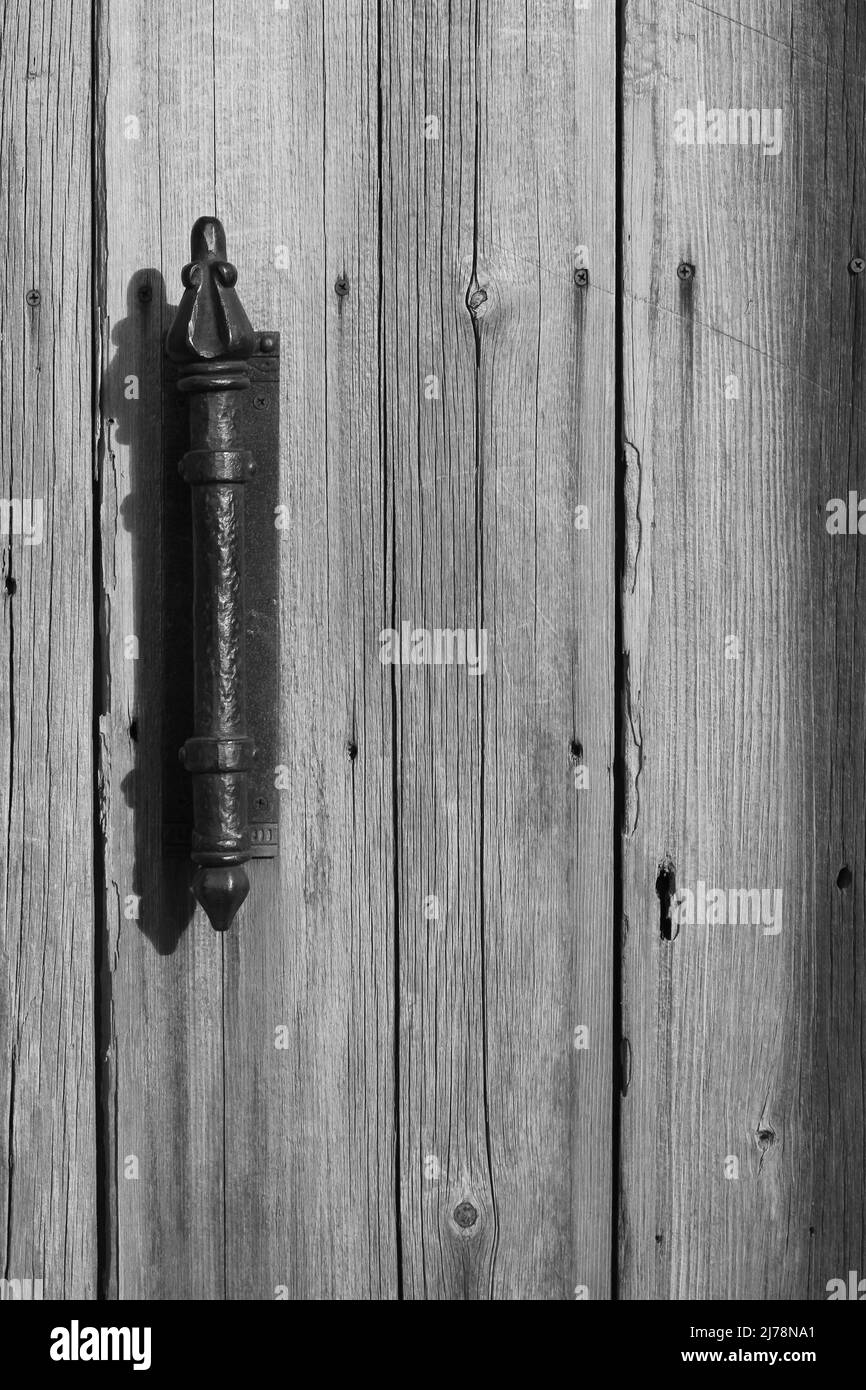 Vintage worn wooden door in black and white Stock Photo - Alamy