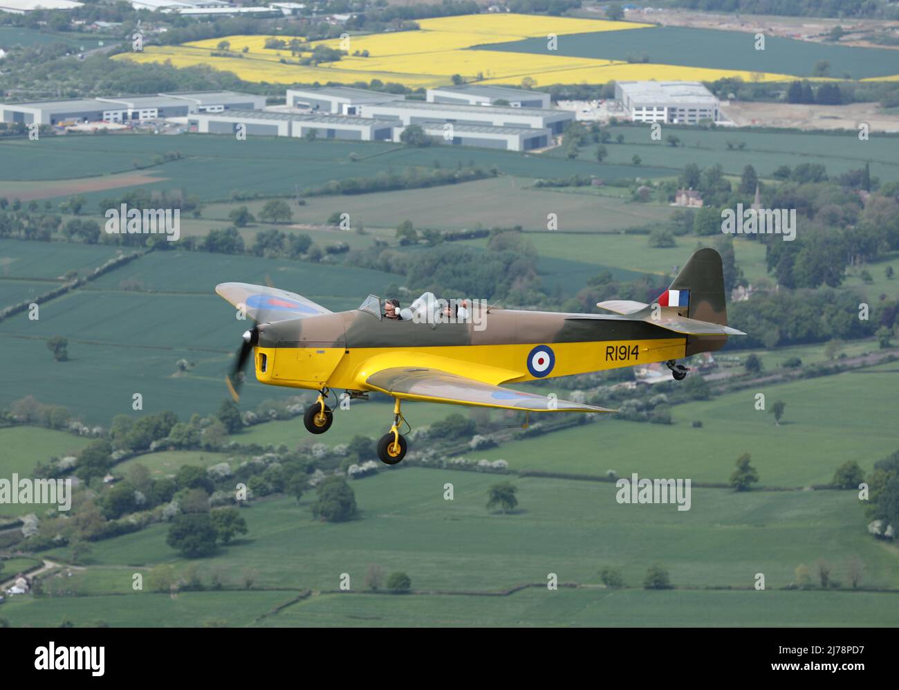 Air 2 Air photograph of the rare Miles Magister, also known as a Miles Hawk Trainer, over the Gloucestershire countryside. 1 of only 5 airworthy. Stock Photo