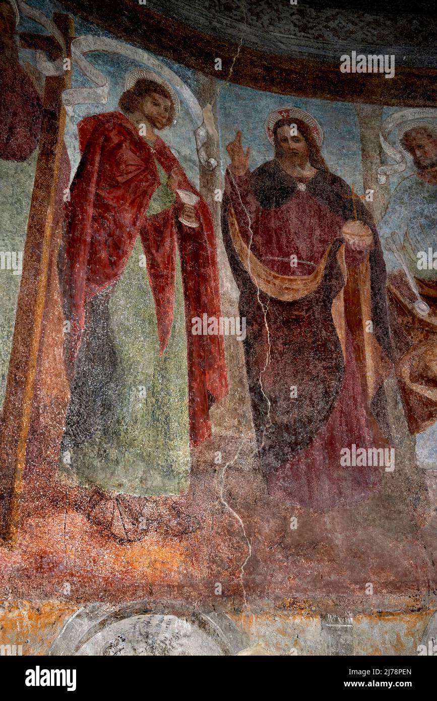 Cristo benedicente e apostolo  - affresco .- Andrea De Passeris  - XVI secolo  - Grosio (So),Italia, chiesa di San Giorgio Stock Photo