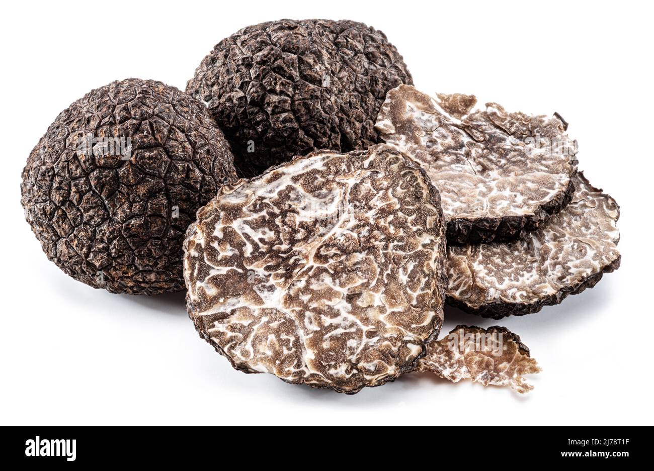 Black winter truffles and truffle slices on white background. The most