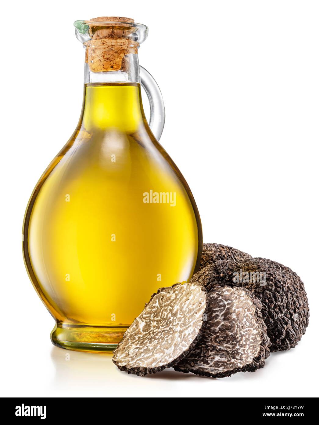 Truffle oil and black edible winter truffle on white background Stock