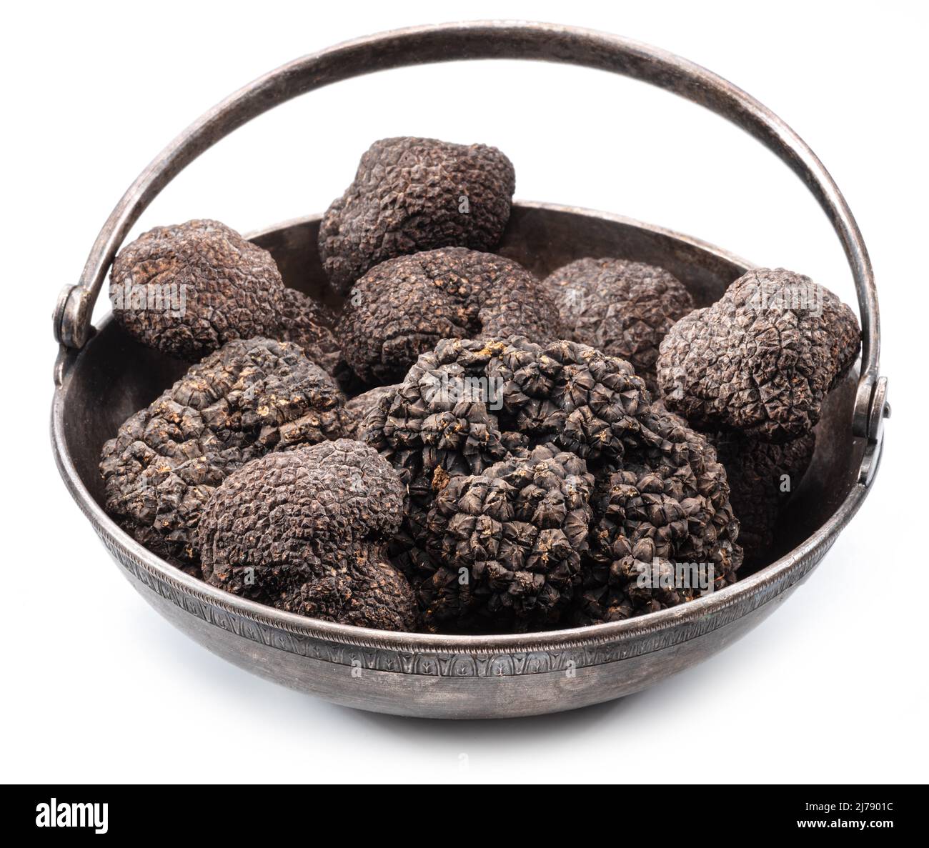 Black winter truffles in the oldfashioned tin bowl isolated on white background Stock Photo Alamy