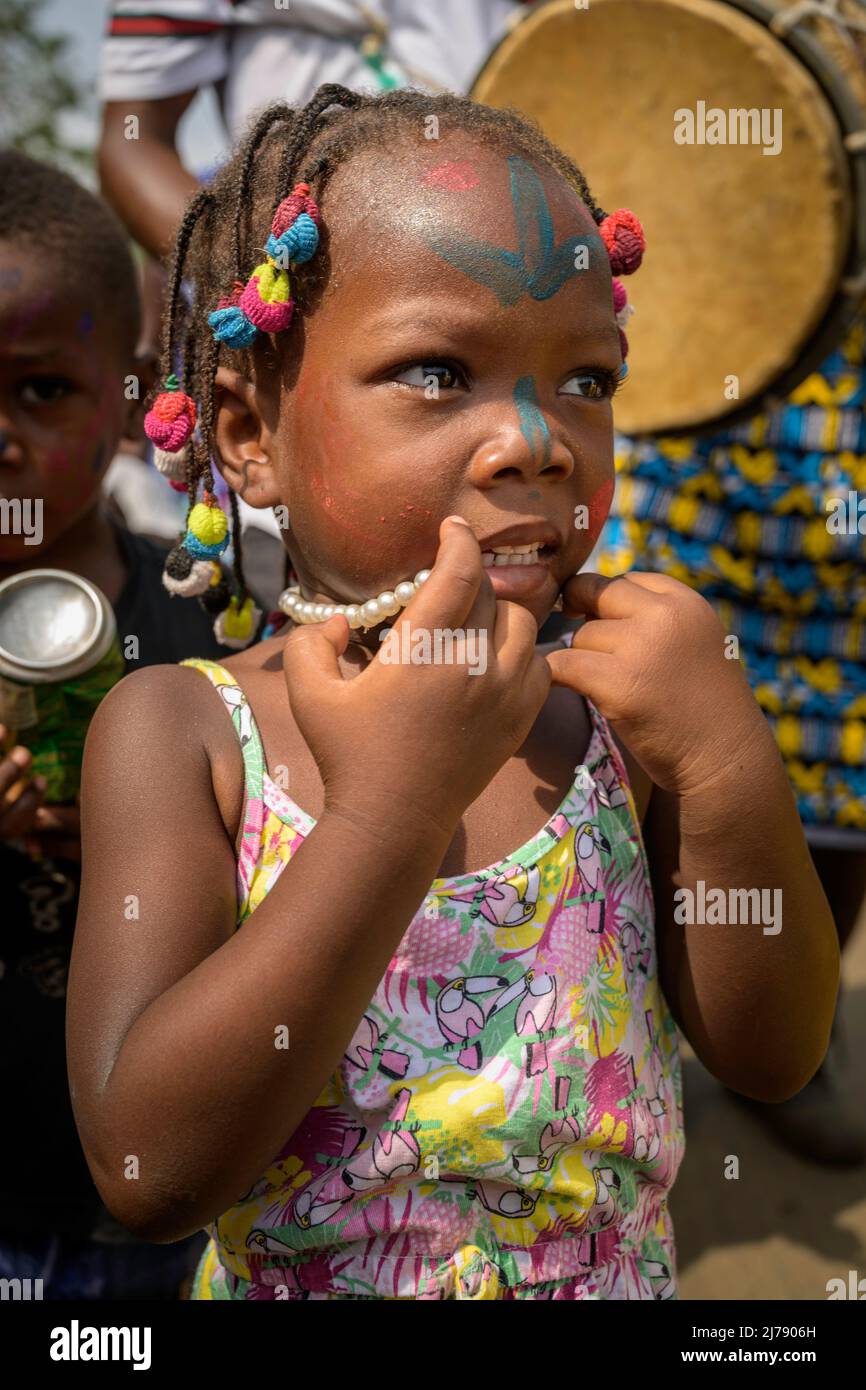 Portrait of a girl with her face painted during the celebration of the school carnival. Stock Photo