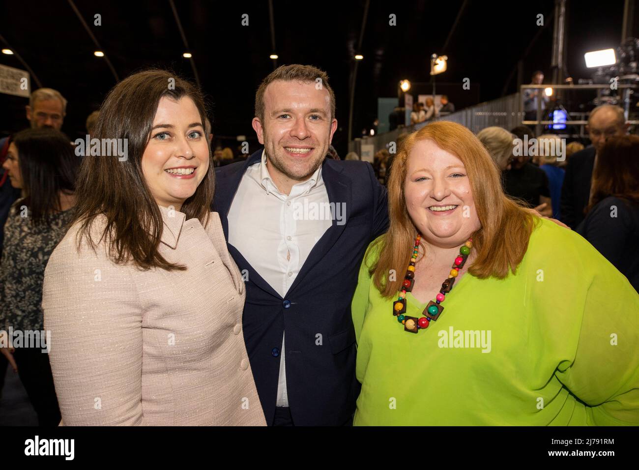 Alliance Party of NI’s leader Naomi Long (right)with Belfast East party candidate Peter McReynolds and his wife Eileen McReynolds (left) at the Titanic Exhibition Centre, Belfast for the Northern Ireland Assembly Election. Picture date: Saturday May 7, 2022. Stock Photo