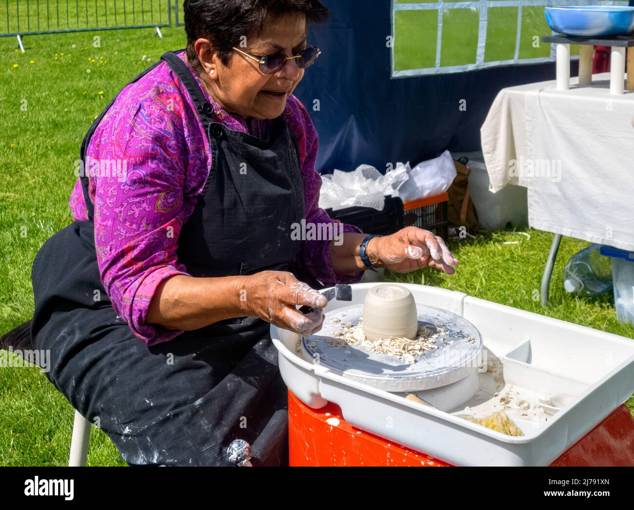 Partial view of lady making pottery at Living Crafts Fair Hatfield