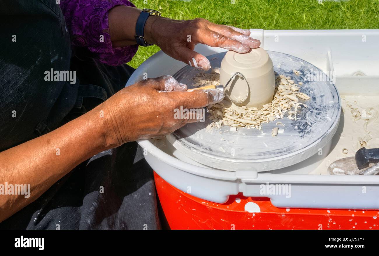 Partial view of lady making pottery at Living Crafts Fair Hatfield