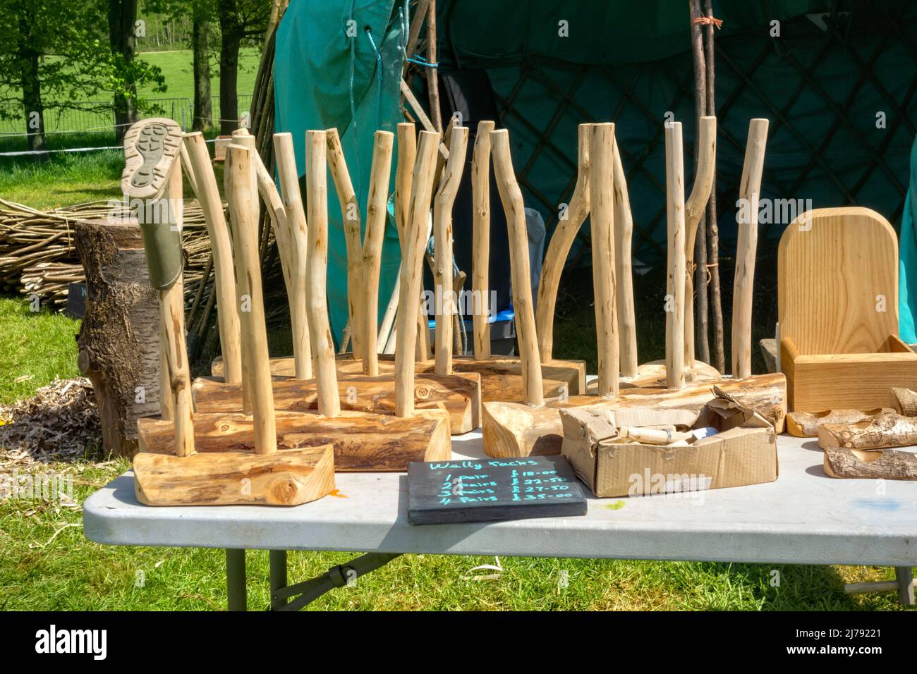 Wellington boot racks carved from wood, Hatfield UK Stock Photo