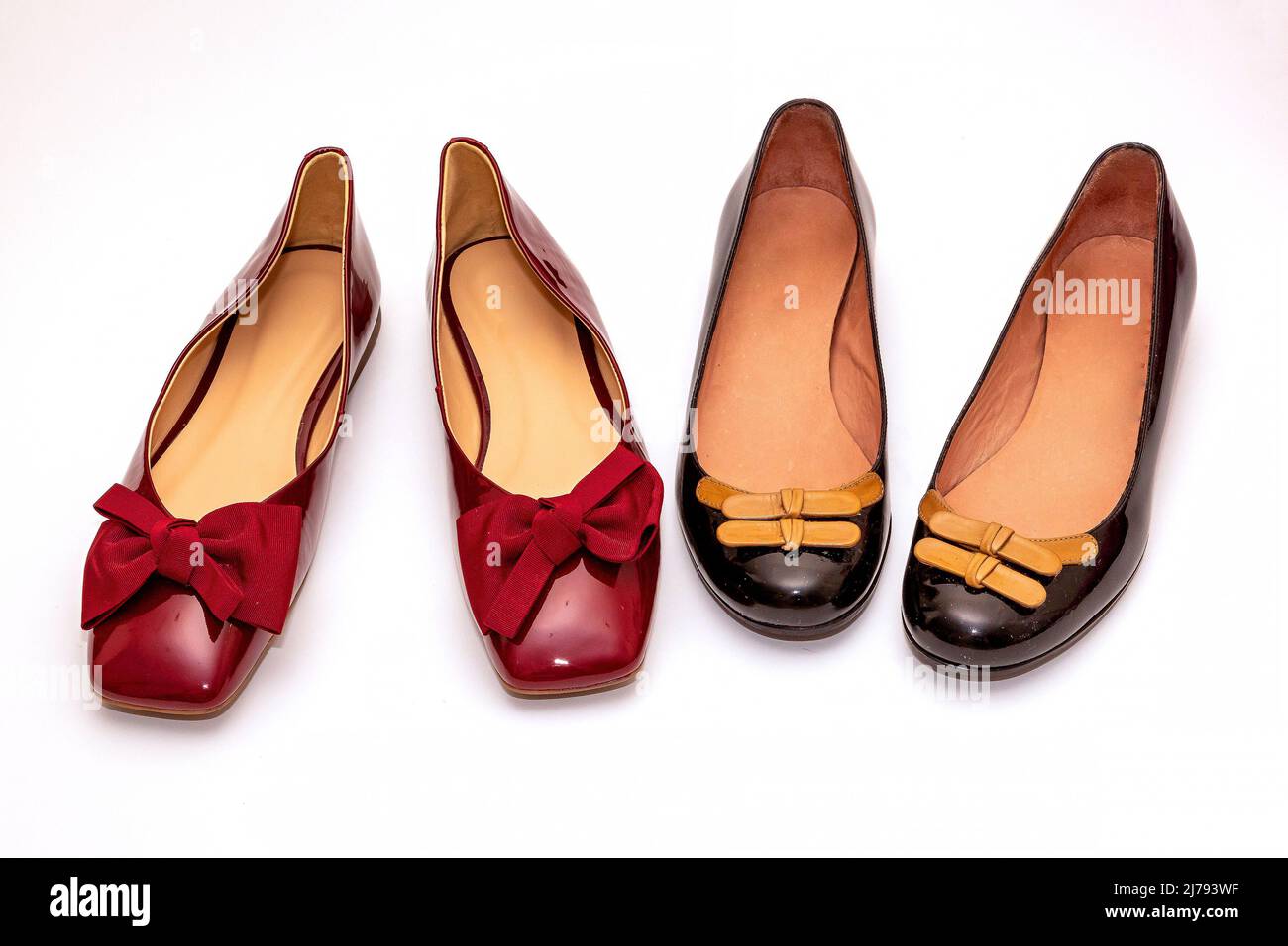 Shiny female patent leather ballerina flat shoes with decorative bows