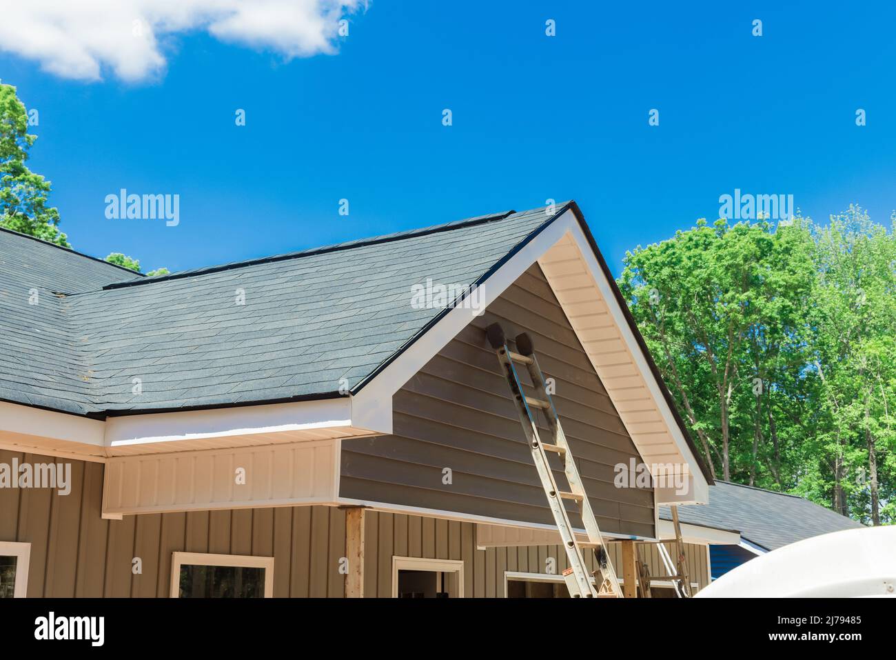 Rooftop construction on roof covered asphalt shingles roofing