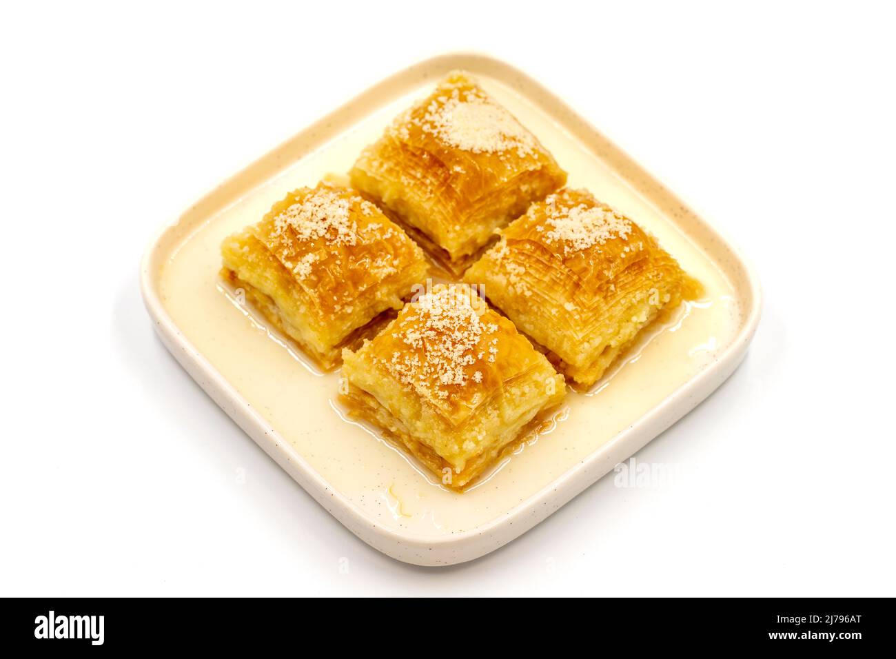 Milk baklava. Baklava with hazelnuts isolated on a white background