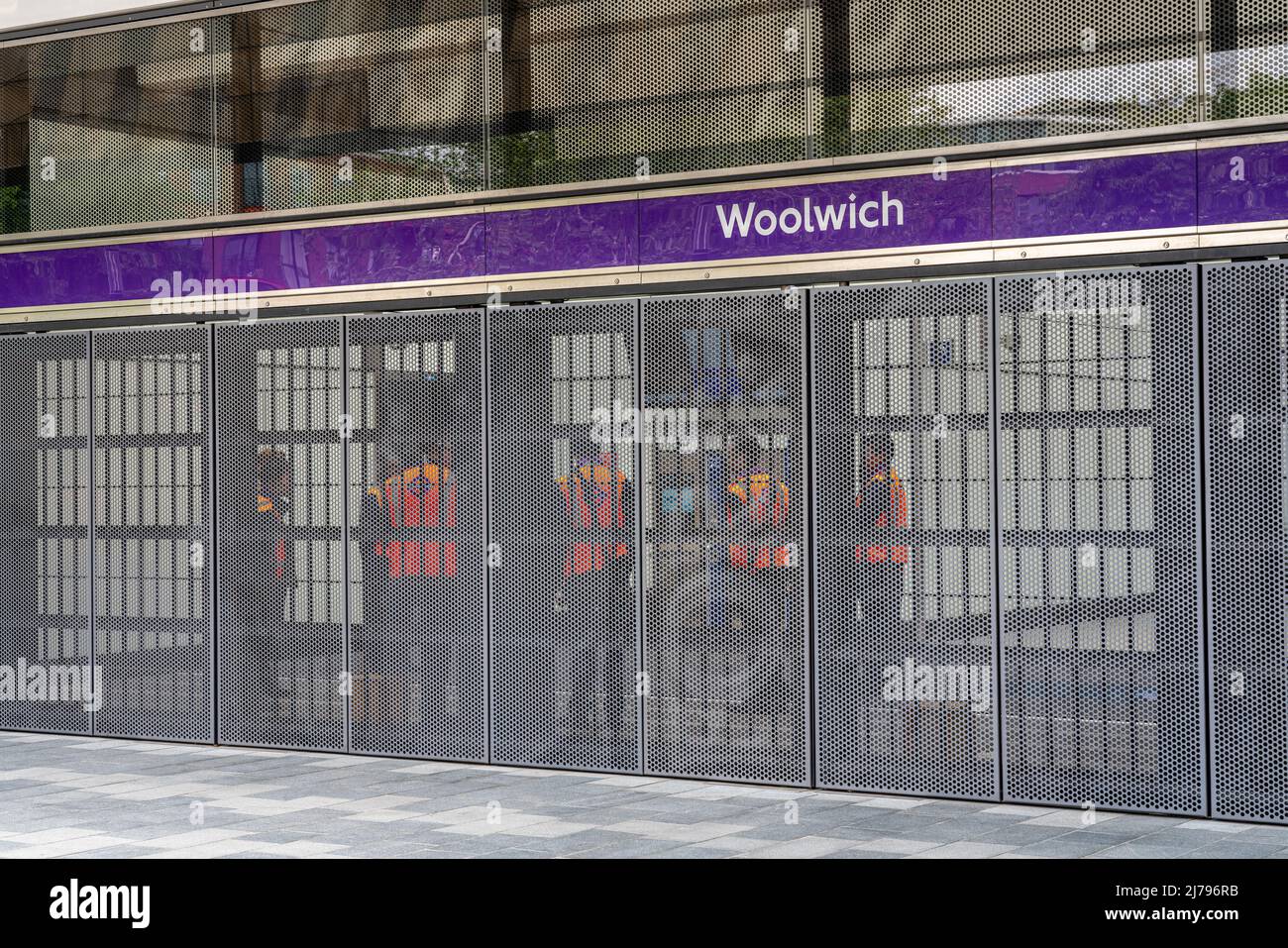 Woolwich, UK - 2 May 2022: TFL workers inside the new Crossrail station due to open later in May 2022 Stock Photo